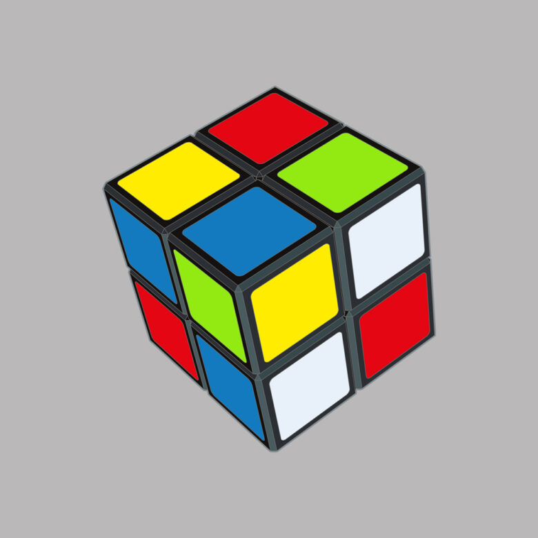 A mini version of the rubiks cube puzzle. The puzzle has squares distinguished by bright colours. To solve the puzzle, all of the squares on each side of the puzzle must be the same.